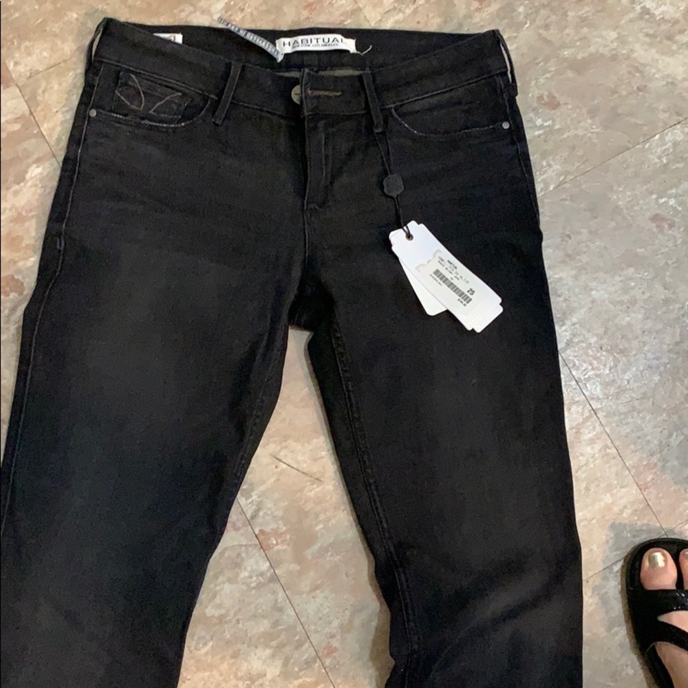 Blackish gray jeans never worn. Size 25